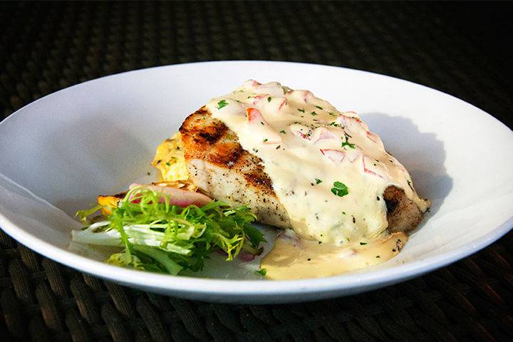 Local fresh catch (pictured: black grouper with a red pepper hollandaise)