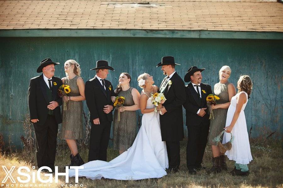 Couple along with bridesmaids and groomsmen