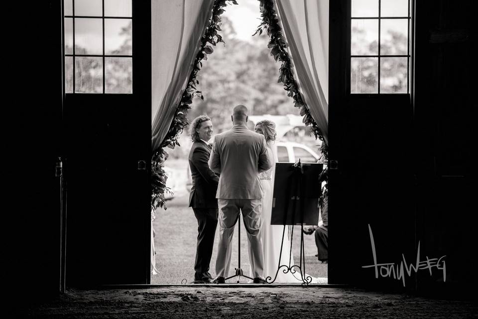 Ceremony by barn doors