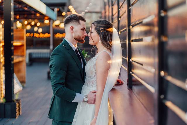 Bride and groom on veranda sun