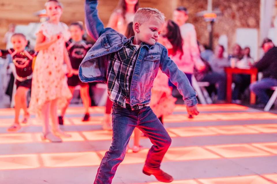 Kid dancing at reception