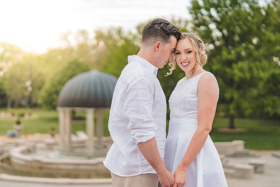 Bride and groom engagement sun
