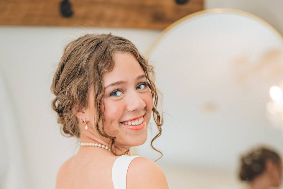 Bride looking back in mirror