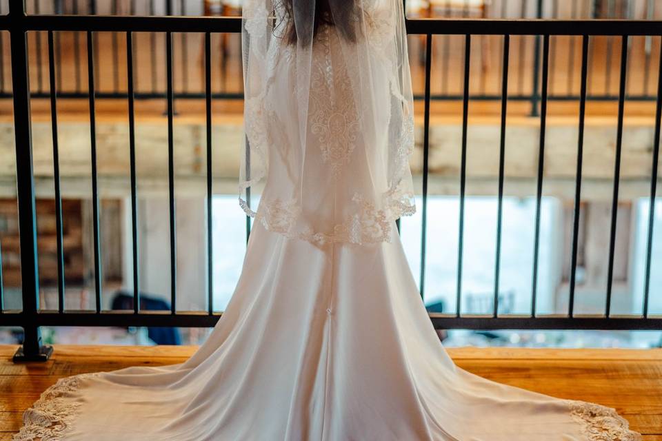 Bride showing off dress