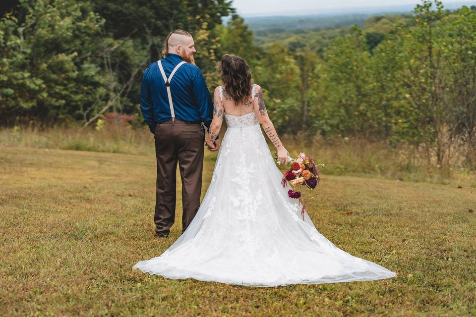 Bride and groom looking off