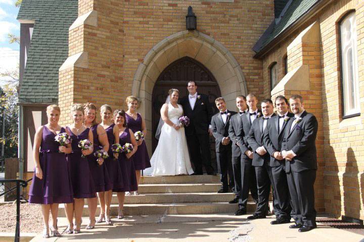 Wedding partyon the main steps