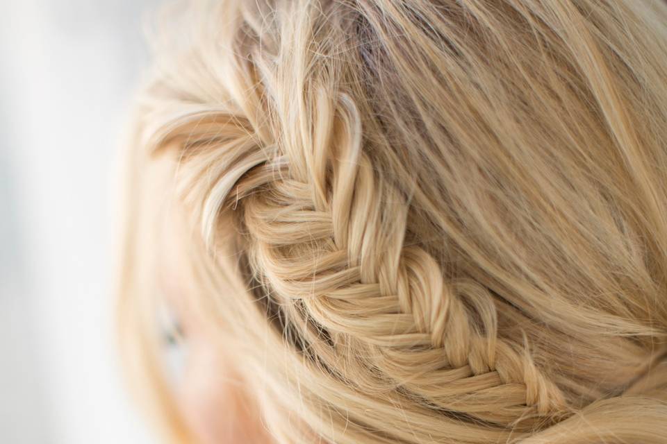 Fishtail braid into a low updo