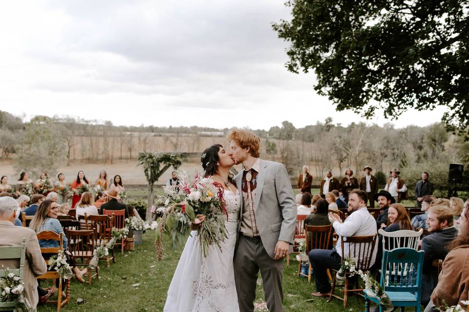 Outdoor ceremony with chairs