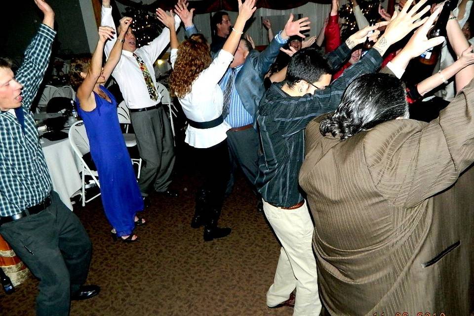 Guest dancing to ymca at the summit resort inn gilford nh.