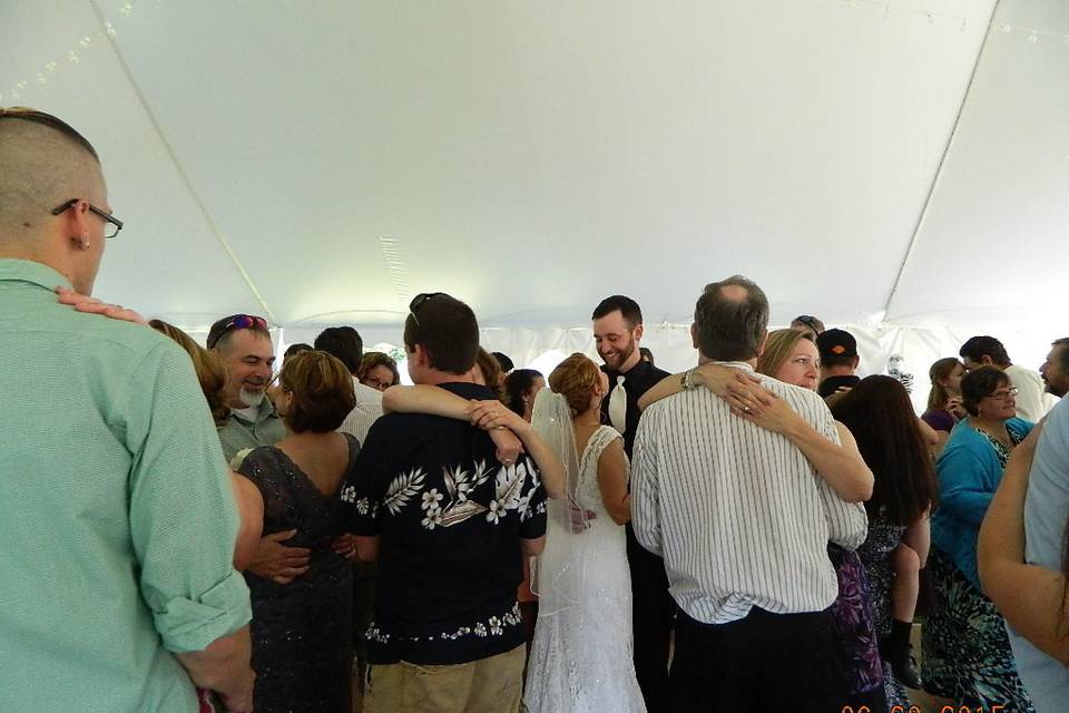 First dance taylor & michael on their wedding day with guests. Outside wedding in colebrook nh