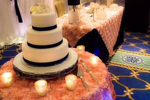 Ihilani wedding. Cake table and sweetheart table design. Table decor, custom backdrop, and uplighting. Hawaii wedding planner, destination wedding planner. Navy and blush color scheme.