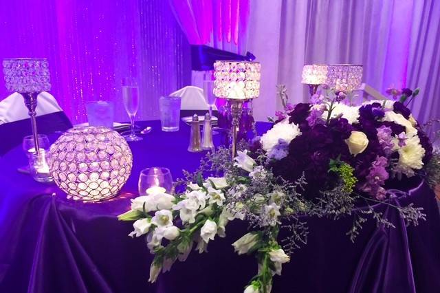 Sweetheart table design and decor.Purple and Silver wedding at the Waikiki Elks Club. Hawaii wedding design. Decor and floral by Bella Amour Events. Destination wedding planner, hawaii wedding design.