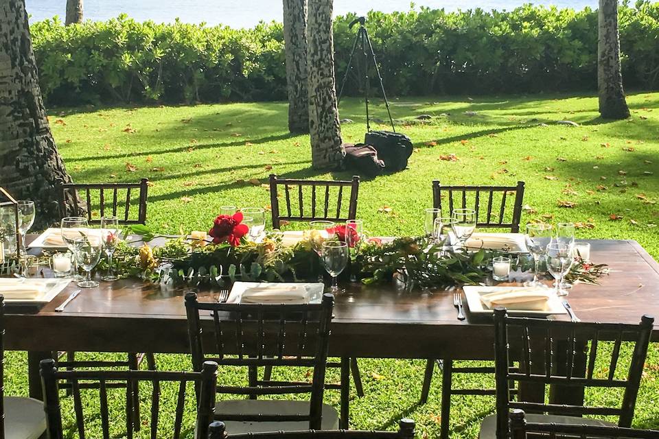 Boho Chic Outdoor Hawaiian Wedding. Venue Lanikohunua and wedding planning and coordination provided by Bella Amour Events Hawaii. Destination wedding planners, custom event design, decor rentals, and floral design. Farm tables and Chivari Chairs