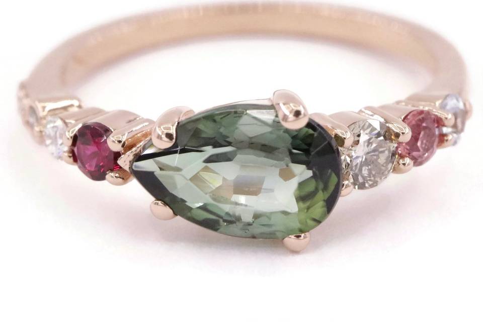 Teardrop green engagement ring