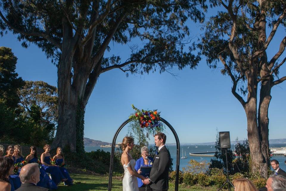 Saying their vows on a lawn overlooking the San Francisco Bay, under blue skies and a warm September sun