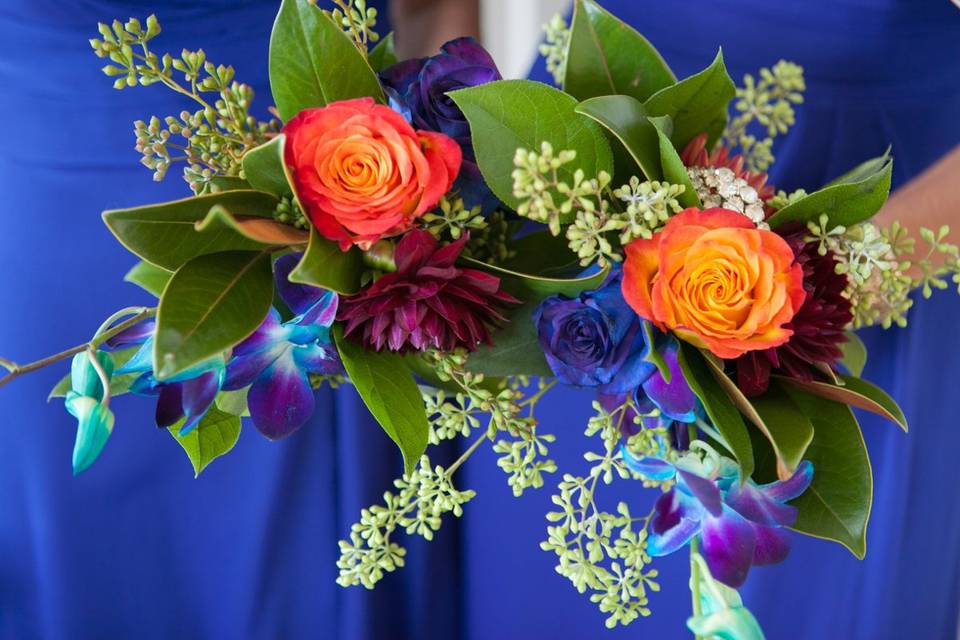 Vibrant jewel tones for bridesmaids dresses and bouquets