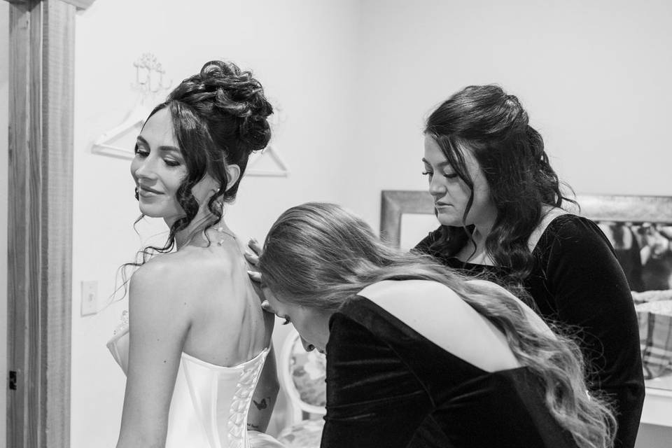 Bride looking out window