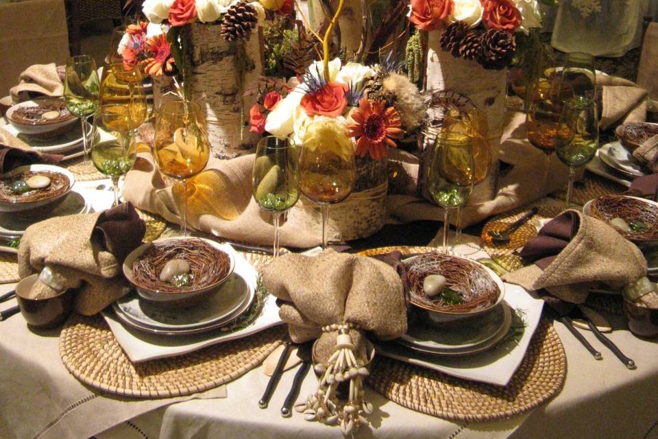 For art-lovers, let a piece of art be the design inspiration for your tablescape! This award-winning design was presented at the 2008 IFDA Tableau table-top competition, in conjunction with Christina Norris of Oversea Yachts, LLC. The sculpture inspired a rustic, fall feel for the table. We are floral artists, ready to take your inspiration and turn it into reality!