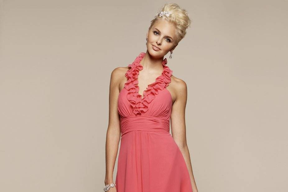 Liz Fields Bridesmaids Dress #361
V-neck spaghetti strap gown with peek-a-boo ruffled sleeves on a soft a-line skirt.