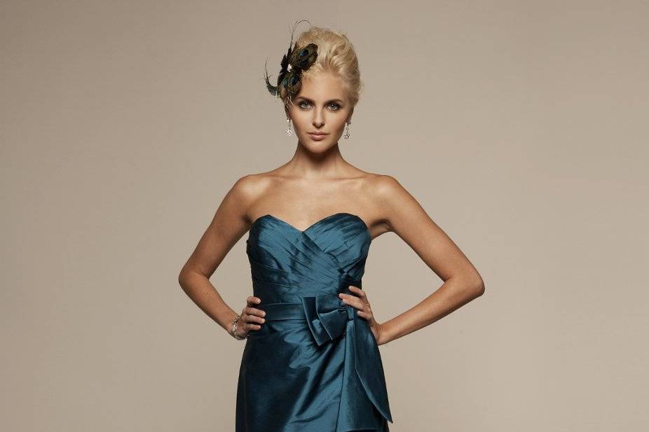 Liz Fields Bridesmaids Dress #369
Asymmetric sweetheart gown with kimono bow and cascading sash detail. Optional spaghetti straps included.
Matching shawl is included.