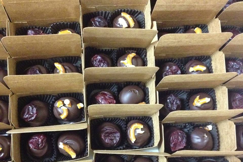 Boxes packed with truffles ready to be sealed, tagged, and delivered!