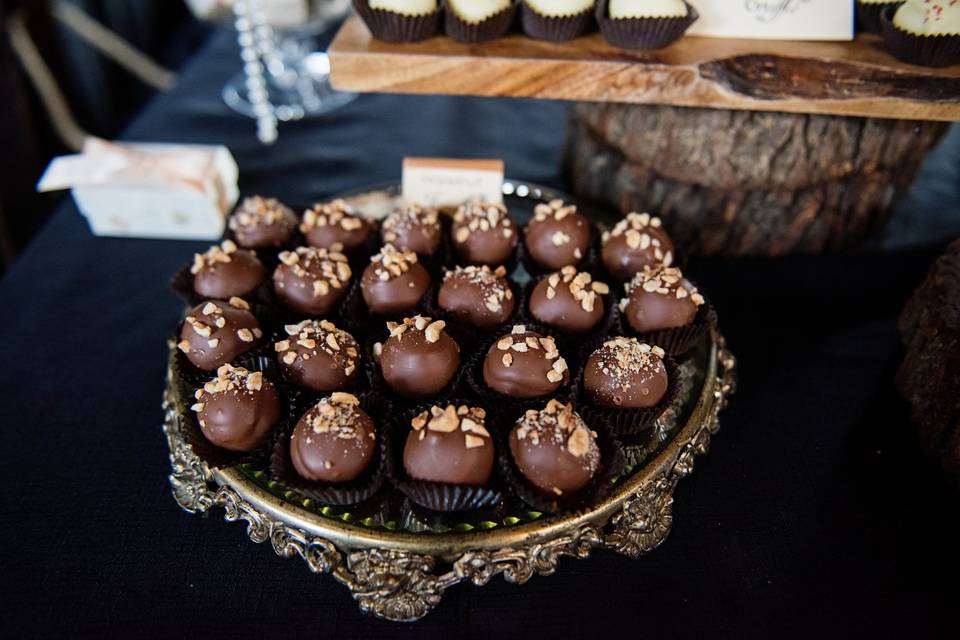 Rustic wood rounds mixed with vintage silver & gold accents, all topped with delicious truffles!