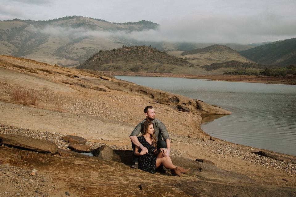 Engaged couple at lake