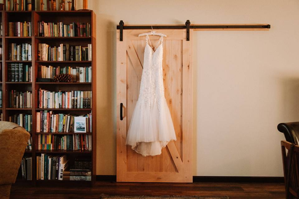 Wedding dress on barn door