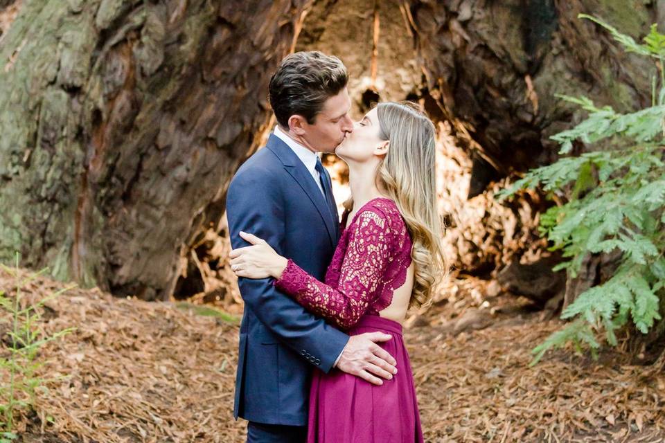 Kiss by a tree