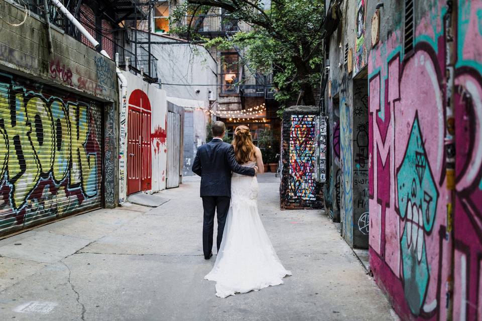 Couple strolling down the alley