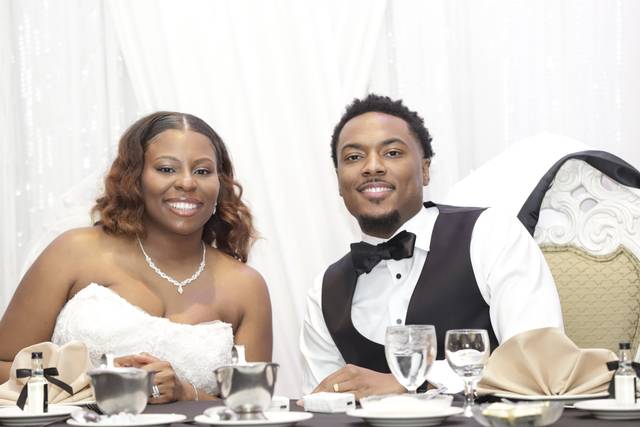 Bride and groom smiling togeth
