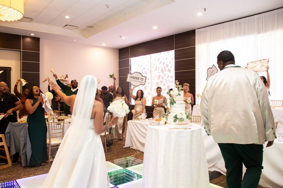 Bride and groom enter their we