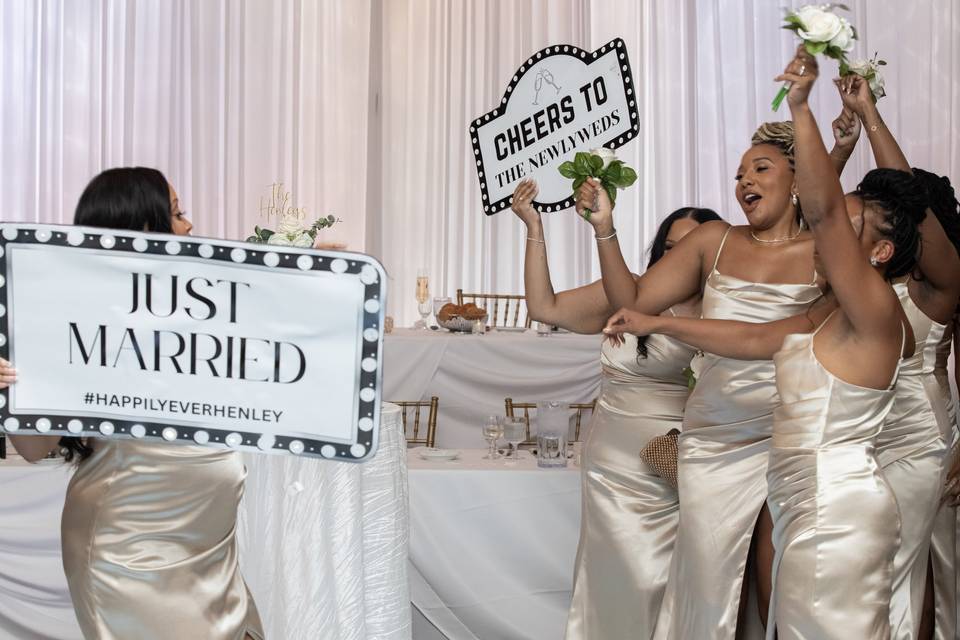 Bridesmaids share a joyful cel