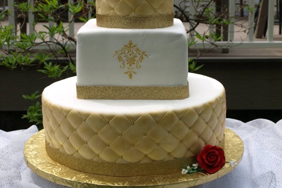 White and gold wedding cake