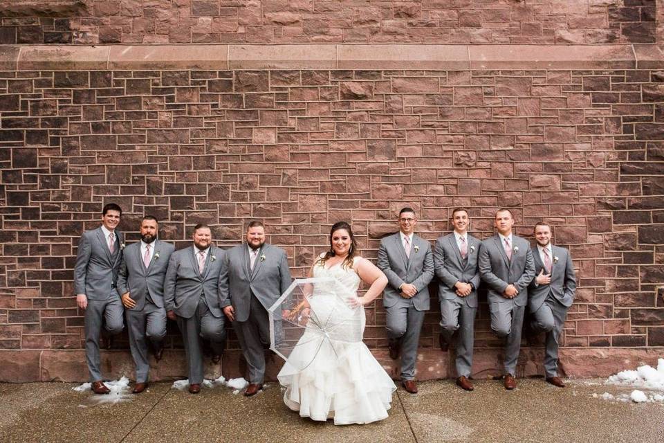 Bridal party at wall