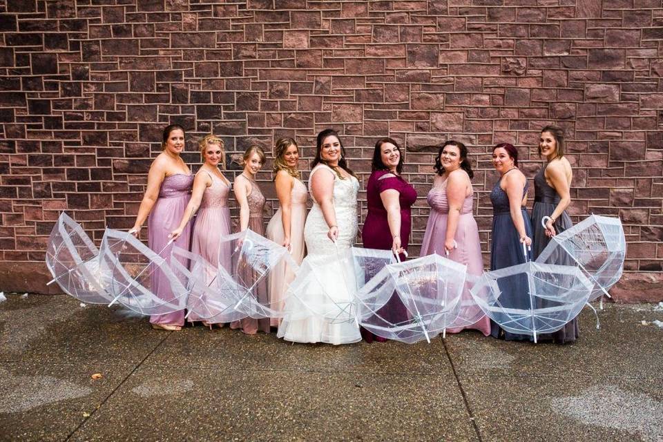 Bridal party at wall