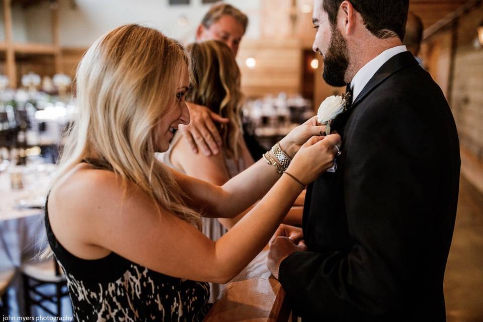 Pinning the boutonniere