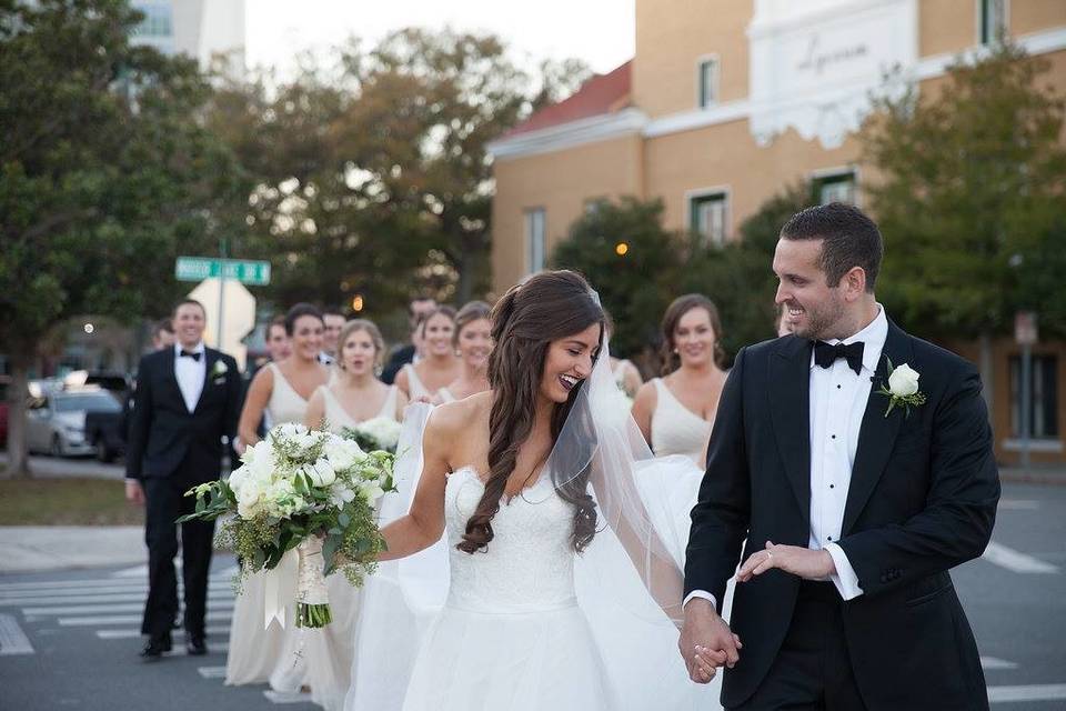 The couple with the bridesmaids and groomsmen