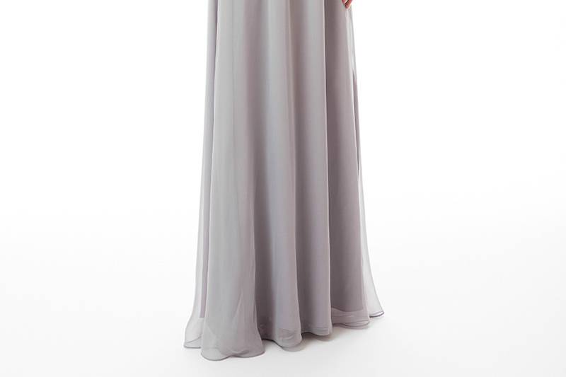 Tatum Short Flowing chiffon cascades from the ruched empire bodice with sweetheart neckline and boned sides, evoking a Grecian feel. The convertible ties can be styled several different waysVariety of colors available