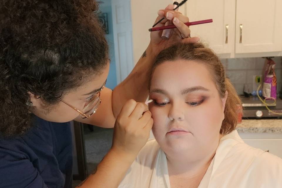 Naomi doing Makeup