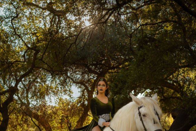 Woman on white horse