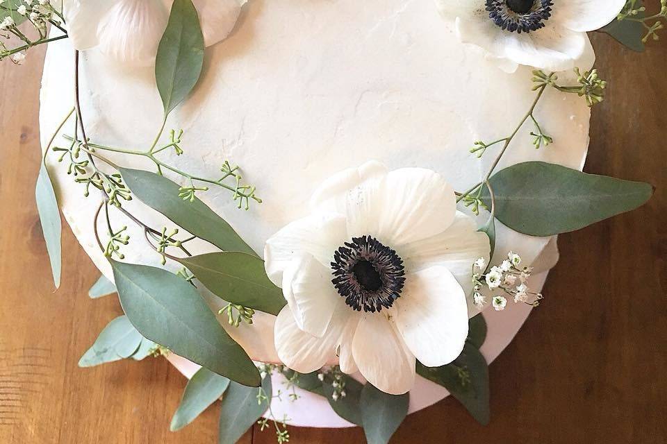 Top view of cake with white flowers