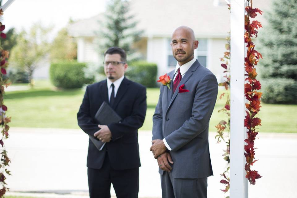 Officiant and groom waiting