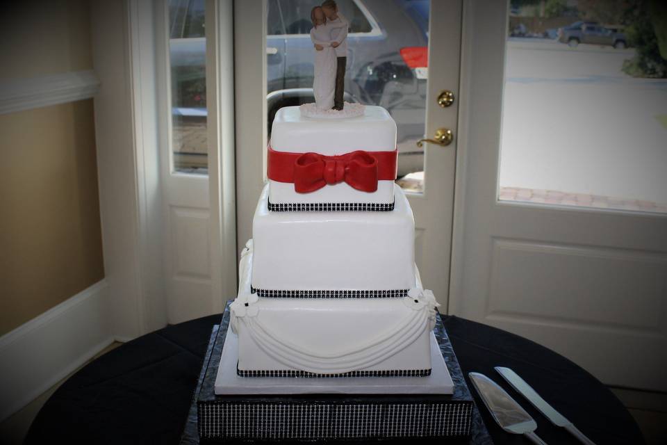 Wedding cake with red bow