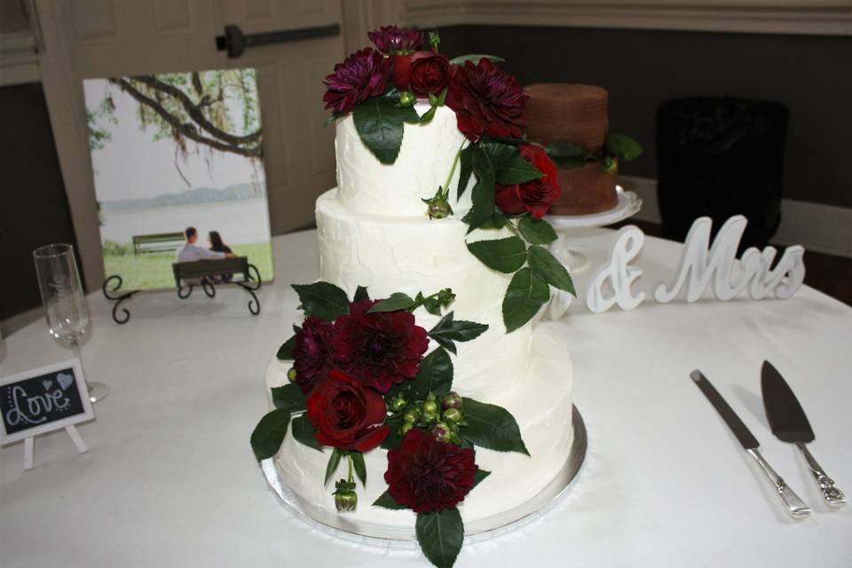 Wedding cake with deep red roses