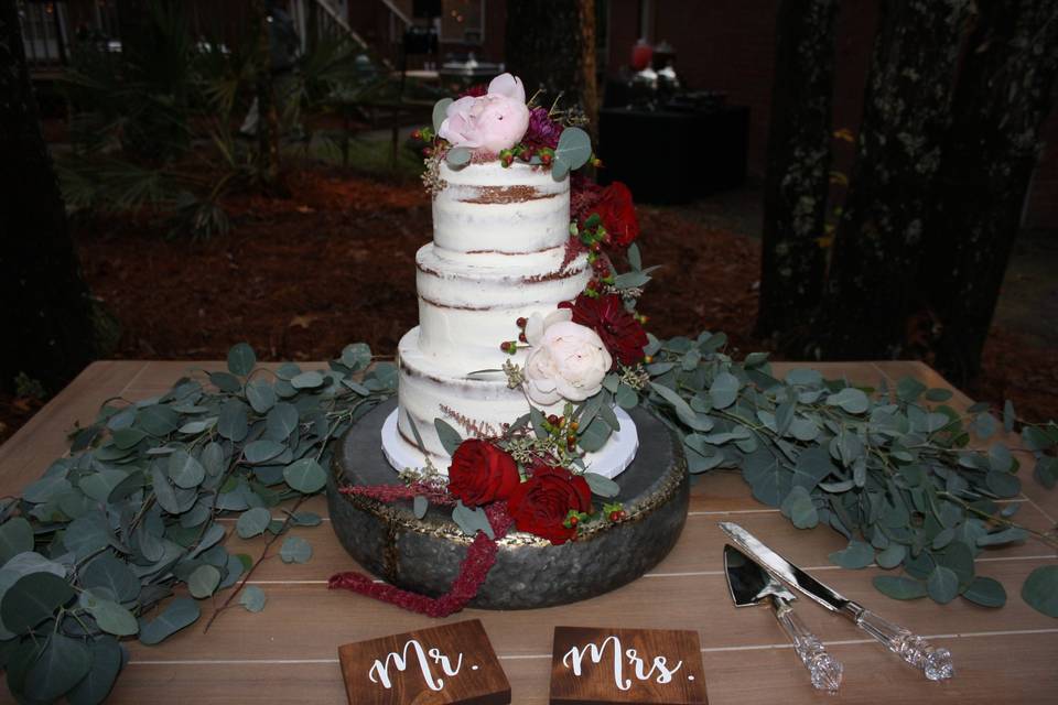 Naked wedding cake with roses