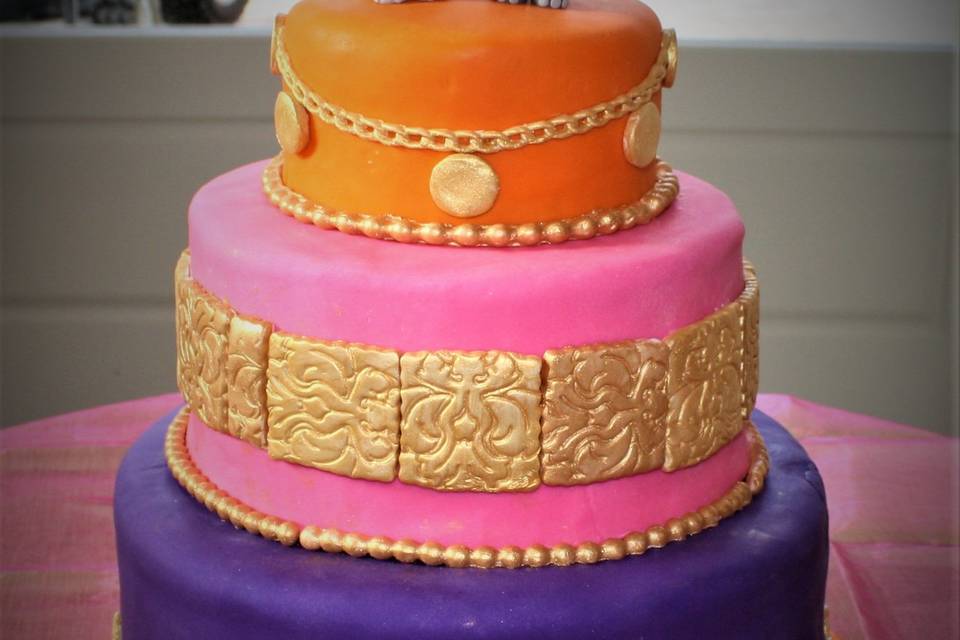 Purple, pink and orange wedding cake