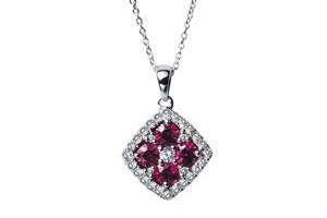 For thousands of years, the ruby has been considered one of the most valuable gemstones on Earth and symbolizes passion. This 14K White Gold Diamond and Ruby pendant is sure to make the perfect addition to your wedding attire!