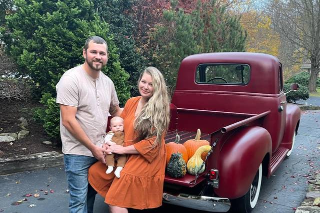 Family with Red Truck