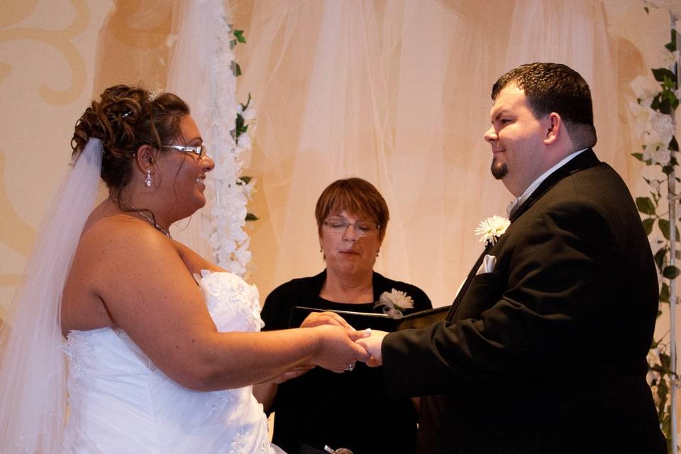 Bride and groom holding hands